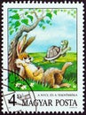 HUNGARY - CIRCA 1987: A stamp printed in Hungary from the `Fairy Tales` issue shows The Hare and The Tortoise Aesop, circa 1987 Royalty Free Stock Photo