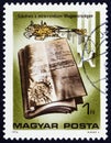 HUNGARY - CIRCA 1976: A stamp printed in Hungary shows Metric System Act, 1876, circa 1976.