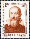 HUNGARY - CIRCA 1964: A stamp printed in Hungary shows a portrait of Galileo, issued for the 400th anniversary of his birth