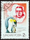 HUNGARY - CIRCA 1987: A stamp printed in Hungary shows Ernest Shackleton and emperor penguins, circa 1987. Royalty Free Stock Photo