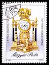 HUNGARY - CIRCA 1990: A stamp printed in Hungary, shows Rococo style Mantel clock by J. M. Welz, 1790, with the same