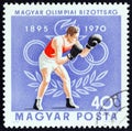 HUNGARY - CIRCA 1970: A stamp printed in Hungary from the `75th anniversary of Hungarian Olympic Committee` issue shows boxing