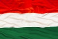 Hungary national flag with waving fabric Royalty Free Stock Photo