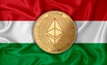 Hungary flag  ethereum gold coin on flag background. The concept of blockchain  bitcoin  currency decentralization in the country Royalty Free Stock Photo