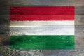 Hungary flag on rustic old wood surface background Royalty Free Stock Photo