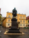 Hungary, Gyor - August 31, 2014: The Statue of Kisfaludy Karoly on Vienna Gate Square in Gyor on an autumn rainy day