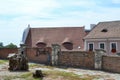 HUNGARY, SZENTENDRE: Street view. Brick wall and big stump.