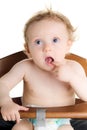 Hungry baby high chair Royalty Free Stock Photo