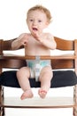 Hungry baby high chair Royalty Free Stock Photo