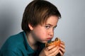 Hungry boy Royalty Free Stock Photo