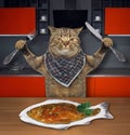 Cat eats fish in the kitchen 2 Royalty Free Stock Photo