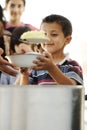 Hungry children in refugee camp Royalty Free Stock Photo