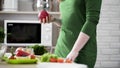 Hungry female holding red apple in hand for snack, healthy choice, vitamins