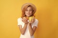 hungry girl with apple fruit. vitamin and dieting. woman in straw hat eating healthy food. Royalty Free Stock Photo