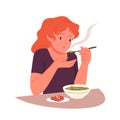 Hungry girl eating hot soup with spoon, person sitting at table with bowl and sandwich