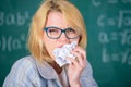 Hungry for knowledge. Teacher ready to eat her paperwork. Teacher eats piece of paper absorb information. Thirst of Royalty Free Stock Photo