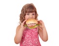 Hungry little girl eat big sandwich