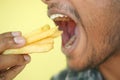 hungry man eating fries closeup Royalty Free Stock Photo