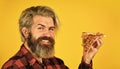hungry man eating pizza. fast food Delivery. eating delicious cheesy pizza. happy bearded man italian food. italy is