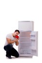 The hungry man looking for money to fill the fridge Royalty Free Stock Photo