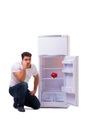 The hungry man looking for money to fill the fridge Royalty Free Stock Photo