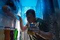 Hungry man raiding his fridge at night Royalty Free Stock Photo