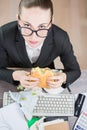 Hungry office worker. Royalty Free Stock Photo