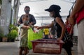 Hungry people get offered food from benevolents.