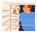 Hungry poor person looking inside empty fridge. Sad upset man with nothing to eat on refrigerator shelf. Food crisis Royalty Free Stock Photo