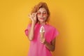 hungry summer woman with cone icecream on background. photo of summer woman