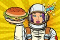 Hungry woman astronaut with Burger