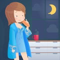 Hungry woman eating bread on kitchen at night