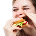 Hungry woman eating sandwich Royalty Free Stock Photo