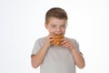 Hungry young boy Royalty Free Stock Photo