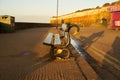 Hunstanton, Norfolk, England, UK - January 1, 2019: Lonely bench in foggy winter evening in Hunstanton beach