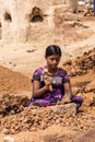 Young girl crushes limeston in Hunsur, Karnataka, India.