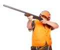 Hunter aiming a shotgun