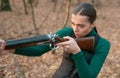 hunter carry rifle. Target shot. female hunter in forest. woman with weapon. successful hunt. hunting sport. girl with Royalty Free Stock Photo