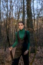 Hunter at dawn. female hunter in forest. girl with rifle. chase hunting. Gun shop. successful hunt. hunting sport Royalty Free Stock Photo