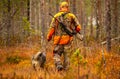 Hunter and his elkhound outdoor - hunting season