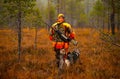 Hunter and his elkhound outdoor - hunting season