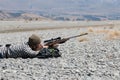 Hunter looking through rifle sight