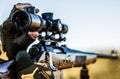 Hunter man. Shooter sighting in the target. Hunting period. Male with a gun. The man is on the hunt. Hunt hunting rifle Royalty Free Stock Photo