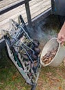 Hunter`s tree stand being smoked to cover and mask human scent.