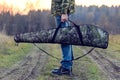 Hunter, shooter with a rifle hidden in a case Royalty Free Stock Photo