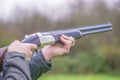 Hunter shooting with rifle Royalty Free Stock Photo