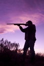 Hunter Shooting in Sunset Royalty Free Stock Photo