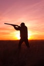 Hunter Shooting at Sunset Royalty Free Stock Photo