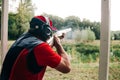 Hunter shoots shotgun target special clothes headphones