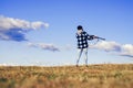 Hunter with shotgun gun on hunt. Illegal Hunting Poacher in the Forest. Hunting is the practice of killing or trapping Royalty Free Stock Photo